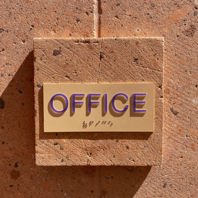 This ADA compliant Office sign uses relief letters and braille to assist the visually impaired to navigate a business building. Get yours through Atlas Wrap Co.