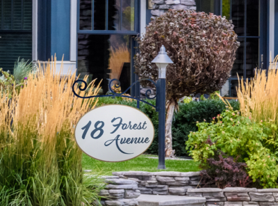 This mockup of a post and panel sign, used for a home address is an example of one of the many sign solutions Atlas Wrap Co can provide!